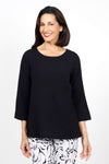 Habitat Travel Swing Tunic in Black.  Solid lightly crinkled top with crew neck and 3/4 sleeve.  Diagonal seaming in front and back with raised edge.  Swing shape.  Slightly oversized fit._t_35123305414856