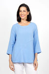 Habitat Travel Swing Tunic in Cornflower. Solid lightly crinkled top with crew neck and 3/4 sleeve. Diagonal seaming in front and back with raised edge. Swing shape. Slightly oversized fit._t_35123305447624