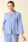 Habitat Travel Pleat Back Jacket in rain blue.  Spread collar button down with matching novelty buttons.  2 front angled pockets with flap detail.  3/4 sleeve. Back yoke with 3 button tab detail.  High low hem.  A line shape. Relaxed fit._t_59962226049390