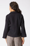 Habitat Travel Jill Shirt in Black.  Textured button down with pointed collar.  Bracelet length sleeve with split cuff.  Single front patch pocket with button closure.  Side slits. Boxy shape.  Relaxed fit._t_61457476845934