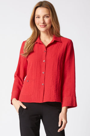 Habitat Travel Jill Shirt in Ruby.  Textured button down with pointed collar.  Bracelet length sleeve with split cuff.  Single front patch pocket with button closure.  Side slits. Boxy shape.  Relaxed fit._61457476878702