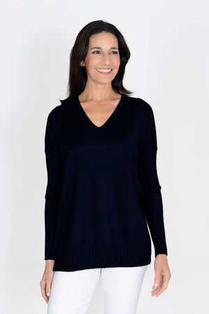 Metric V Neck Ribbed Sleeve Sweater in Black. V neck sweater with dropped shoulder and long ribbed sleeve. Ribbed hem with side slits. Relaxed fit._34740564984008