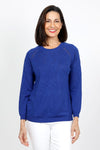 Metric Pointelle Crew Neck Sweater in Galaxy Blue a bright royal.  Crew neck long sleeve sweater with raglan sleeves.  Pointelle stitching at seams. Rib trim at neck, hem and cuff.  Classic fit_t_35103948865736