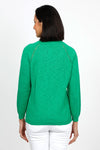 Metric Pointelle Crew Neck Sweater in kelly Green. Crew neck long sleeve sweater with raglan sleeves. Pointelle stitching at seams. Rib trim at neck, hem and cuff. Classic fit._t_35103948701896