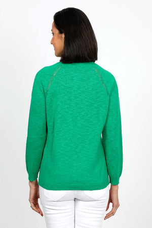 Metric Pointelle Crew Neck Sweater in kelly Green. Crew neck long sleeve sweater with raglan sleeves. Pointelle stitching at seams. Rib trim at neck, hem and cuff. Classic fit._35103948701896