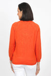 Metric Pointelle Crew Neck Sweater in Orange. Crew neck long sleeve sweater with raglan sleeves. Pointelle stitching at seams. Rib trim at neck, hem and cuff. Classic fit._t_35103948636360