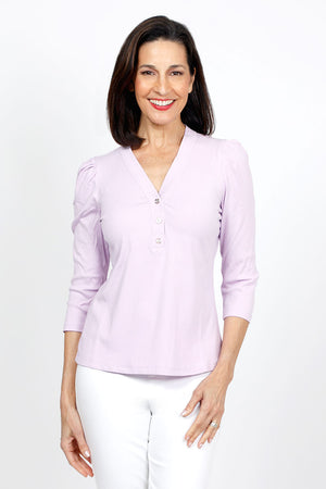 Metric 3 Button Henley Sweater in Lavender.  V neck with 3 button placket.  Gold tone buttons.  3/4 sleeve with puffed shoulder.  Straight hem.  Body skimming fit. _35104610222280