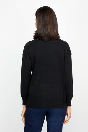 Metric Side Seam Sweater in Black.  Square neck long sleeve sweater with dropped shoulder.  Raised seam detail at shoulders.  Off center raised seams in front and back.  Deep rib at hem and cuff. Side slits.  Relaxed fit._61376537690478