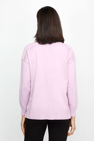 Metric Side Seam Sweater in Lilac.  Square neck long sleeve sweater with dropped shoulder.  Raised seam detail at shoulders.  Off center raised seams in front and back.  Deep rib at hem and cuff. Side slits.  Relaxed fit._61376537821550