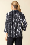 Habitat Travel Circle Pleat Back Jacket in Black with a white circle print.  Spread collar button down jacket with novelty buttons.  3/4 sleeve.  2 front angled pouch pockets with sewn flap detail.  Back  center tab with 3 button detail and soft pleating. Relaxed fit._t_59962933444974