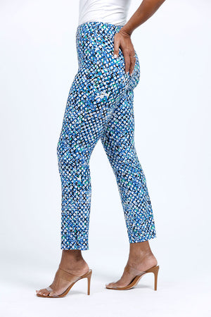 Holland Ave Abstract Bubbles Ankle Pant. Blue green and black small trellis print on a white background. Pull on pant with 2 1/2" curved waistband. Snug through hip and thigh, falls straight to hem. 28" inseam._34900034650312