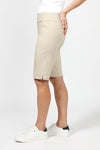 Holland Ave Bermuda Short in Stone. 2 1/2" waistband with 2 front slash pockets. 11" inseam. Snug through stomach and hip, slim to hem._t_34995042222280
