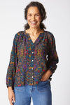 Habitat Vine Romance Shirt in Black.  Delicate multi colored floral print on black background.  Banded crew with notched v.  Button down.  Raglan bracelet sleeve with button cuff.  Side slits.  Boxy shape.  Relaxed fit._t_61286665617774