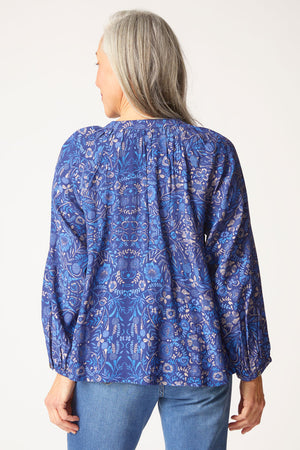 Habitat Vine Romance Shirt in Ink.  Delicate multi neutral floral print on ink blue background.  Banded crew with notched v.  Button down.  Raglan bracelet sleeve with button cuff.  Side slits.  Boxy shape.  Relaxed fit._61286665748846