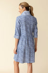 Habitat Crinkle Miami Lanai Dress in Rain.  Multi blue miniature geometric print.  Pointed collar button down shirt dress with drop waist. Double tiered skirt.  3/4 sleeve with roll button tab.  Side seam pockets.  Contrast print on collar and placket.  Relaxed fit._t_60331528520046