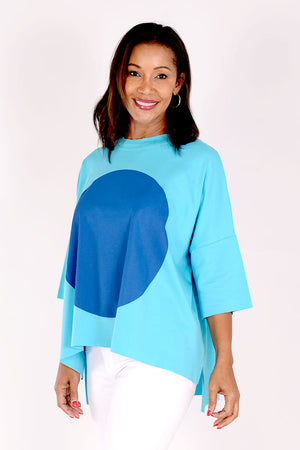 Planet ORB T in Turquoise with a large Royal screen print circle in front.  Crew neck with drop shoulder and 3/4 length sleeve.  High low hem.  Oversized fit._34239543050440