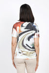 Top Ligne Swirls V neck Top. Black, beige swirl print with splashes of red and green on a white background. Lightly stamped and perforated design. V neck with short sleeves. Sublimation screen printing allows white streaks to show through. Relaxed fit._t_35526271533256