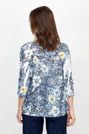 Top Ligne Daisy Side Tie Top with Sequin Trim in Black Multi.  Daisy print on a black and white stamp print background.  Sweetheart neckline 3/4 sleeve top with front asymmetric tie.  Clear sequin tab on lower sleeve. Relaxed fit._61436943008110