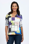 The Squares Pocket Top  features a relaxed shape  and a hidden front pocket. We love the combination of the easy-to-wear a-line shape and the luxurious poly-jersey fabric with a bit of stretch.  White streaks known as sublimation "smiles" are part of the dying process and create a unique pattern._t_34735775383752