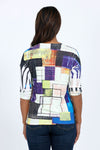 The Squares Pocket Top  features a relaxed shape  and a hidden front pocket. We love the combination of the easy-to-wear a-line shape and the luxurious poly-jersey fabric with a bit of stretch.  White streaks known as sublimation "smiles" are part of the dying process and create a unique pattern._t_34735775416520