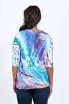 The Color Burst Pocket Top  features a relaxed shape  and a hidden front pocket. We love the combination of the easy-to-wear a-line shape and the luxurious poly-jersey fabric with a bit of stretch.  White streaks known as sublimation "smiles" are part of the dying process and create a unique pattern._t_34735780856008