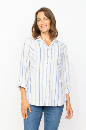 Habitat Coastal Boyfriend Tunic.  Multi colored blue embroidered vertical stripes on a white background.  Pointed collar button down.  3/4 sleeve with roll button tab.  Side insets at armole in diagonal stripe.  Back waist detail.  Shirt tail hem. Relaxed fit._35537067933896