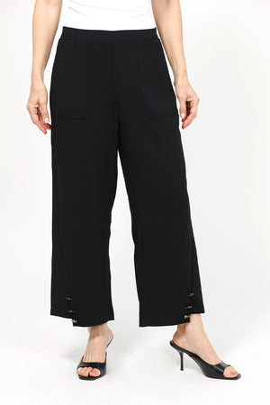 Lemon Grass Crop Pant with Button Detail.  Pull on pant with 1 1/2" waistband elasticized in back.  Faux front welt pocket detail.  Draped leg.  Side insets at hem create step hem.  3 button detail at hem.  25" inseam._35087786901704