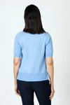 Metric Short Sleeve Pointelle Sweater in Light Denim.  Crew neck, raglan short sleeve knit with pointelle stitching on sleeve. Raised center front seam.  Rib trim at neck, hem and cuff.  Relaxed fit._t_59972752474478