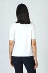 Metric Short Sleeve Pointelle Sweater in White.  Crew neck, raglan short sleeve knit with pointelle stitching on sleeve. Raised center front seam.  Rib trim at neck, hem and cuff.  Relaxed fit._t_59972752441710