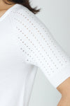 Metric Short Sleeve Pointelle Sweater in White.  Crew neck, raglan short sleeve knit with pointelle stitching on sleeve. Raised center front seam.  Rib trim at neck, hem and cuff.  Relaxed fit._t_59972752507246