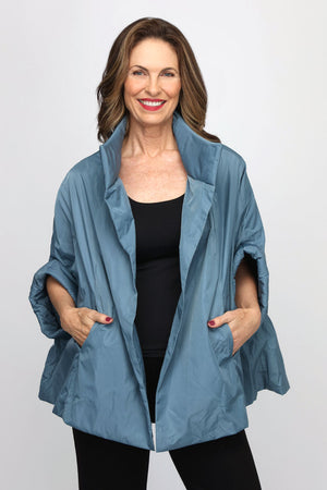 Planet Nylon Chic Cape in Vapor, a slate blue. Cocoon shaped double faced nylon jacket with 2 openings for arms. Cross between cape and a poncho._60881096704366