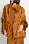 Planet Nylon Chic Cape in Chestnut. Cocoon shaped double faced nylon jacket with 2 openings for arms. Cross between cape and a poncho._t_61184992641390