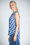 APNY Dot That Sleeveless Blouse in Blue. Block print with dots and stripes in shades of blue and white. Sleeveless banded collar button down blouse. A line shape. Curved hem. Relaxed fit._t_35227691745480