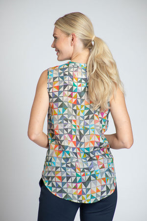 APNY Flipped Sleeveless Blouse in Multi. Triangle print in small squares print. Banded crew neck pleat front sleeveless blouse. Shirt tail hem. Back yoke. Relaxed fit._34808783667400