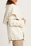 Planet Chicest Windbreaker in Stone.  Open front french terry jacket with oversized front collar and hood.  Long roll back sleeves.  Front angled flap pockets.  Back center drawstring at hem.  Oversized fit.  One size fits many._t_61020495380846