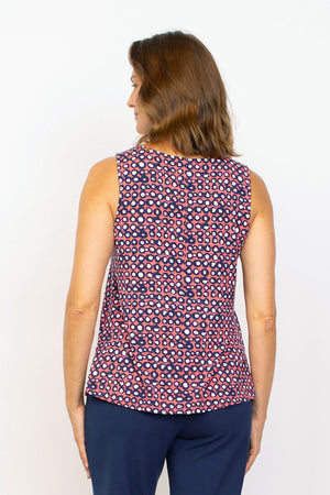 Habitat Travel Knit Easy Dot Tank. Crew neck sleeveless a line tank. Blue rimmed white dots on an orange background. Relaxed fit._35285578907848