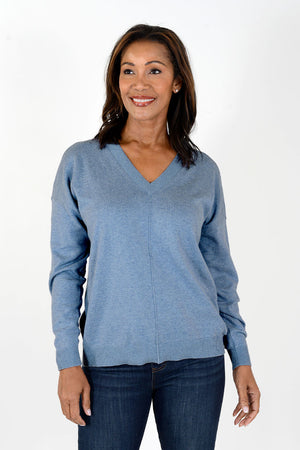 Elliott Lauren Cotton Cashmere V Neck Sweater in Petrol, a heathered medium blue. V neck sweater with long sleeves. Raised center seam in front and back. Ribbed trim at neck, cuff and hem. Side slits. Relaxed fit._34451642843336