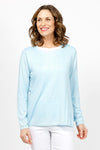 Elliott Lauren Double Layer Sweater in light Blue.  Tee shirt/knit combo.  Crew neck sweater with white trim at neck and armhole seams.  Long sleeves and side slits.  White cotton tee underlayer.  Unlined sleeves.  Relaxed fit._t_35067862188232