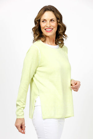 Elliott Lauren Double Layer Sweater in Key Lime. Tee shirt/knit combo. Crew neck sweater with white trim at neck and armhole seams. Long sleeves and side slits. White cotton tee underlayer. Unlined sleeves. Relaxed fit._35067862515912