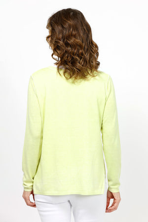 Elliott Lauren Double Layer Sweater in Key Lime. Tee shirt/knit combo. Crew neck sweater with white trim at neck and armhole seams. Long sleeves and side slits. White cotton tee underlayer. Unlined sleeves. Relaxed fit._35067862024392