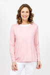 Elliott Lauren Double Layer Sweater in light Pink. Tee shirt/knit combo. Crew neck sweater with white trim at neck and armhole seams. Long sleeves and side slits. White cotton tee underlayer. Unlined sleeves. Relaxed fit._t_35067861565640