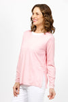 Elliott Lauren Double Layer Sweater in light Pink. Tee shirt/knit combo. Crew neck sweater with white trim at neck and armhole seams. Long sleeves and side slits. White cotton tee underlayer. Unlined sleeves. Relaxed fit._t_35067862646984