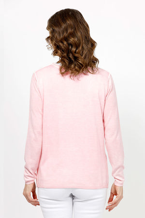 Elliott Lauren Double Layer Sweater in light Pink. Tee shirt/knit combo. Crew neck sweater with white trim at neck and armhole seams. Long sleeves and side slits. White cotton tee underlayer. Unlined sleeves. Relaxed fit._35067862253768