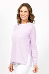 Elliott Lauren Double Layer Sweater in Wisteria, a light purple. Tee shirt/knit combo. Crew neck sweater with white trim at neck and armhole seams. Long sleeves and side slits. White cotton tee underlayer. Unlined sleeves. Relaxed fit._t_35067861434568