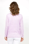 Elliott Lauren Double Layer Sweater in Wisteria, a light purple. Tee shirt/knit combo. Crew neck sweater with white trim at neck and armhole seams. Long sleeves and side slits. White cotton tee underlayer. Unlined sleeves. Relaxed fit._t_35067861663944