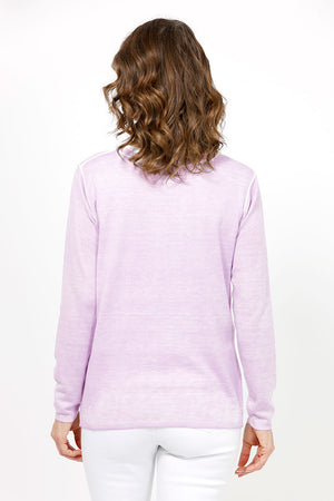 Elliott Lauren Double Layer Sweater in Wisteria, a light purple. Tee shirt/knit combo. Crew neck sweater with white trim at neck and armhole seams. Long sleeves and side slits. White cotton tee underlayer. Unlined sleeves. Relaxed fit._35067861663944
