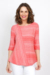 Habitat Waves Mixed Direction Top in Melon. Textural waved stripes in a non wrinkle fabric. Front asymmetric diagonal seam stripe with horizontal stripe panel. Horizontal striped back. Crew neck, 3/4 sleeve. Relaxed fit._t_35420237594824
