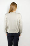 Elliott Lauren Pop Top Crystal Sleeve Sweater in Almond. Crew neck lightweight sweater with long sleeves.  Tonal crystal embellishments on lower sleeve.  Rib trim at neck, hem and cuff.  Relaxed fit._t_61405401547118