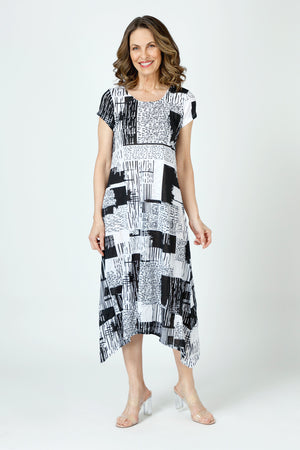 Top Ligne Dashes and Squares Midi Dress in Black/White geometric print.  Scoop neck front with short sleeves.  A line with asymmetric sharkbite hem.  Relaxed fit._60001010319726