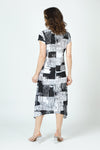 Top Ligne Dashes and Squares Midi Dress in Black/White geometric print.  Scoop neck front with short sleeves.  A line with asymmetric sharkbite hem.  Relaxed fit._t_60001010286958